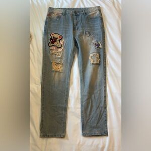 PATCHWORK distressed straight leg jeans